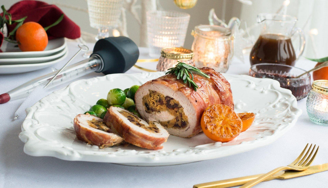 Rolled turkey breast with herby cranberry stuffing & crispy bacon