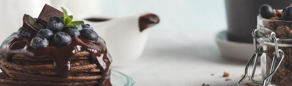 Chocolate Pancakes with Chocolate Sauce and Blueberries