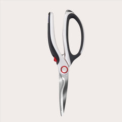 The Zyliss All Purpose Shears, featuring black and white handles and sharp, serrated stainless steel blades, are shown open on a plain white background.