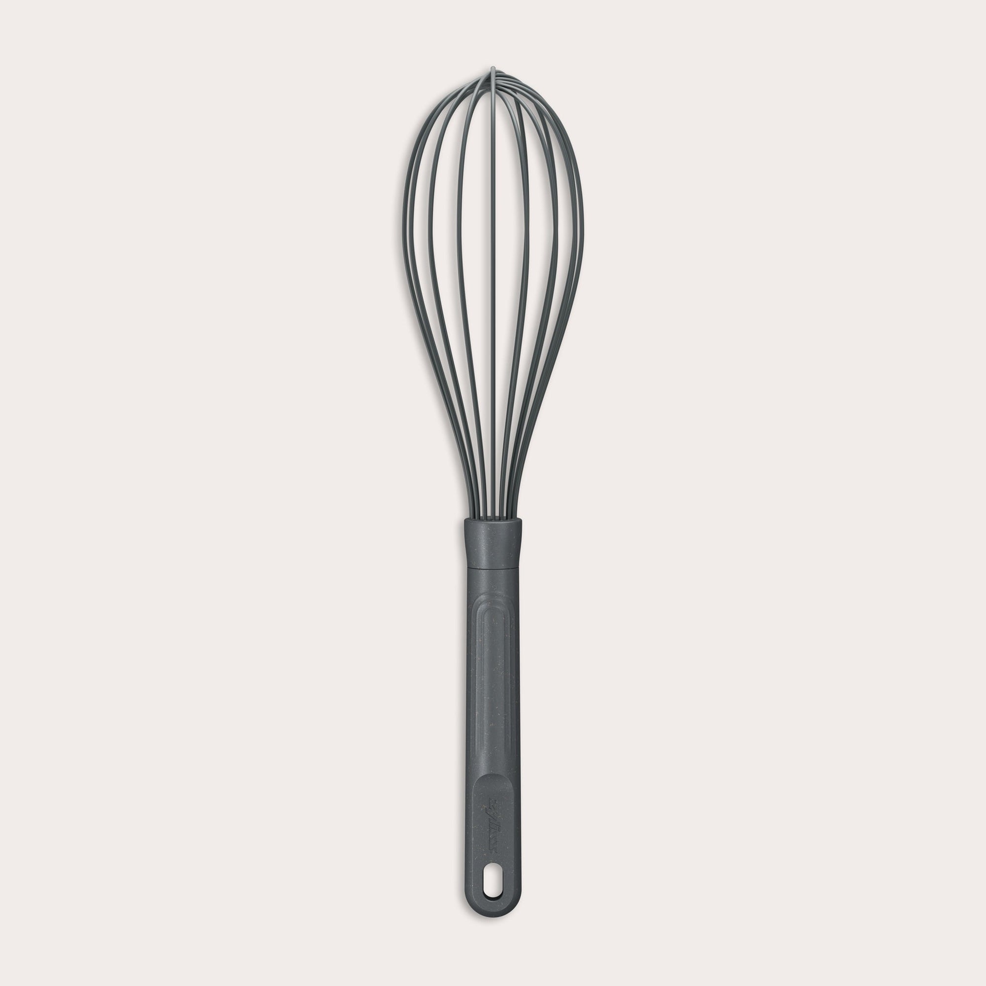 A black silicone whisk with a long handle and multiple loops, shown against a plain white background.