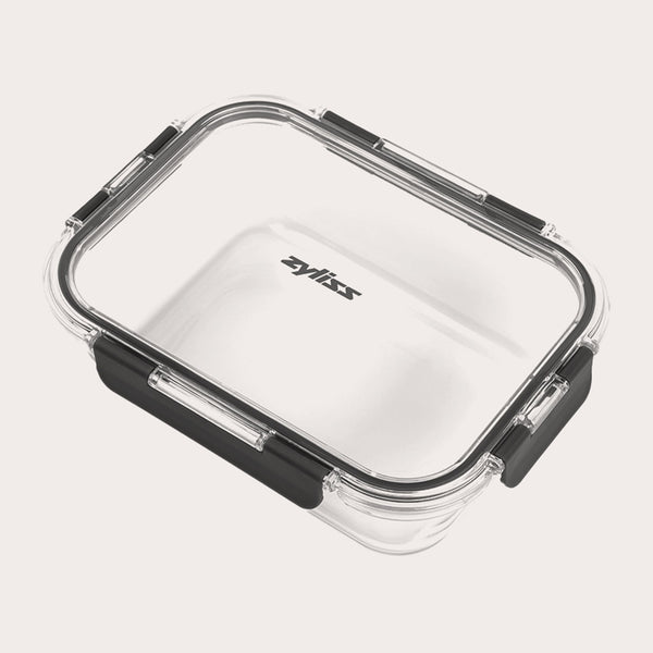 The Zyliss Glass Container features a clear rectangular design, transparent lid with four black locking clips for a secure seal, and the Zyliss logo printed on the lid—ideal for meal prep. #1.52L/1.61qt