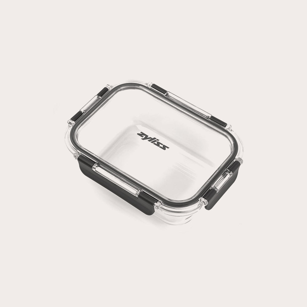 A rectangular glass container branded Zyliss features a clear base, transparent lid, and black locking clips on each side for a secure seal. #0.64L/0.67qt