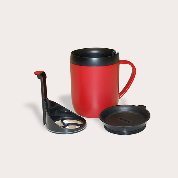 The Zyliss Hot Mug Cafetière Mug features double-wall insulation, a red exterior, black interior, separate black lid, and sleek black-silver detachable infuser—ideal for coffee lovers—displayed on a plain light background. #red